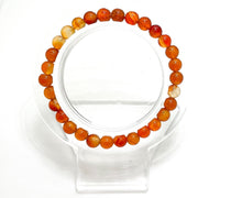 Load image into Gallery viewer, Natural Carnelian Smooth Round Sphere Ball Stretch Gemstone Bracelet