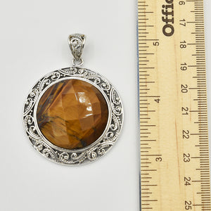 Tiger-eye Faceted Sterling Silver Pendant - Round - one of a kind